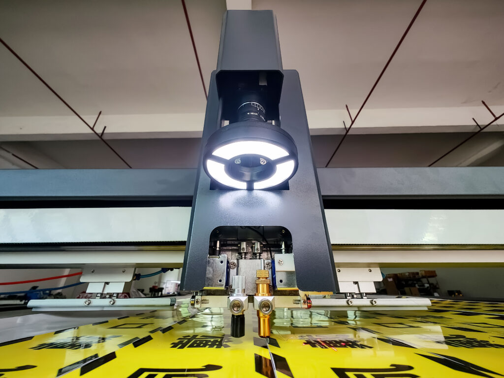 Camera module above printed material on a JEKE cutting table